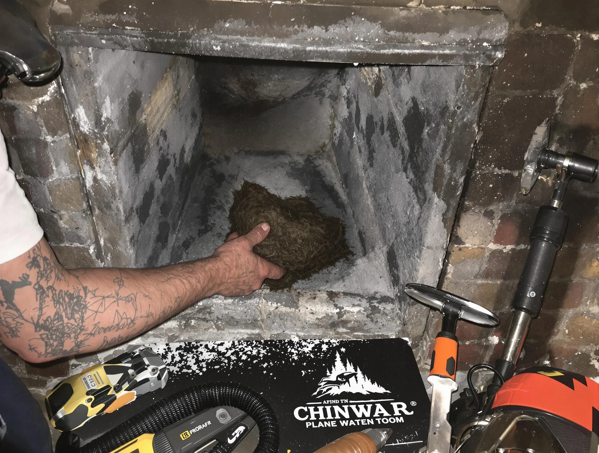 El Reno Chimney Sweep safely removing debris and screening chimney in El Reno, OK